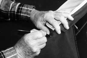 Marking the frame through the hole in the fabric