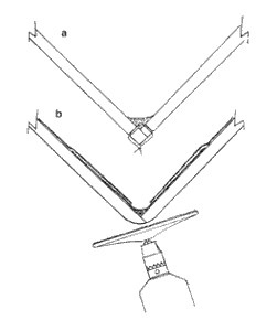 Cover the corner with cloth. Round corner with sander.